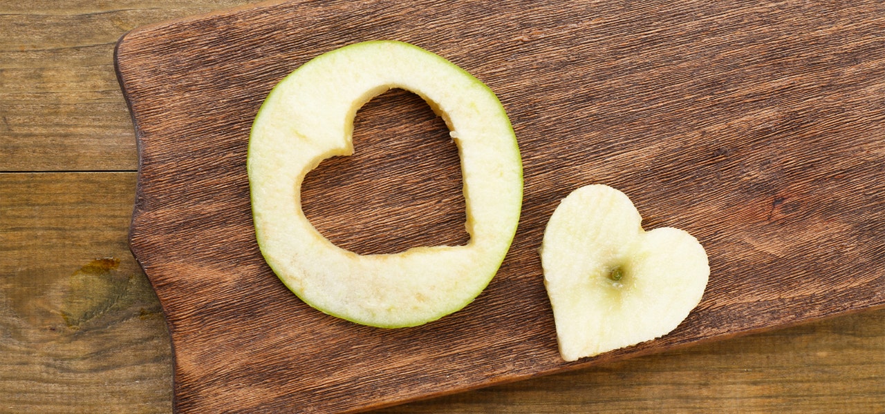 Apple cut into heart shapes